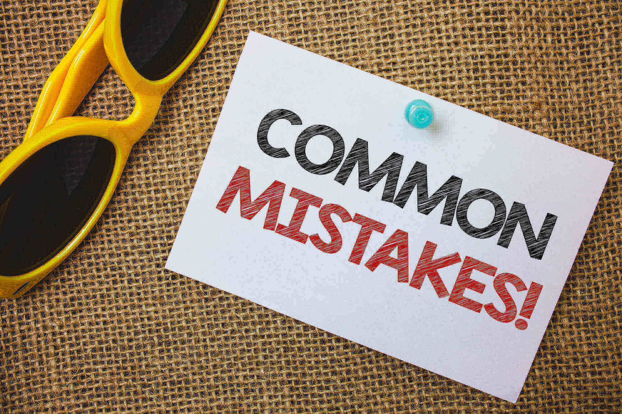 Writing note showing Common Mistakes Motivational Call